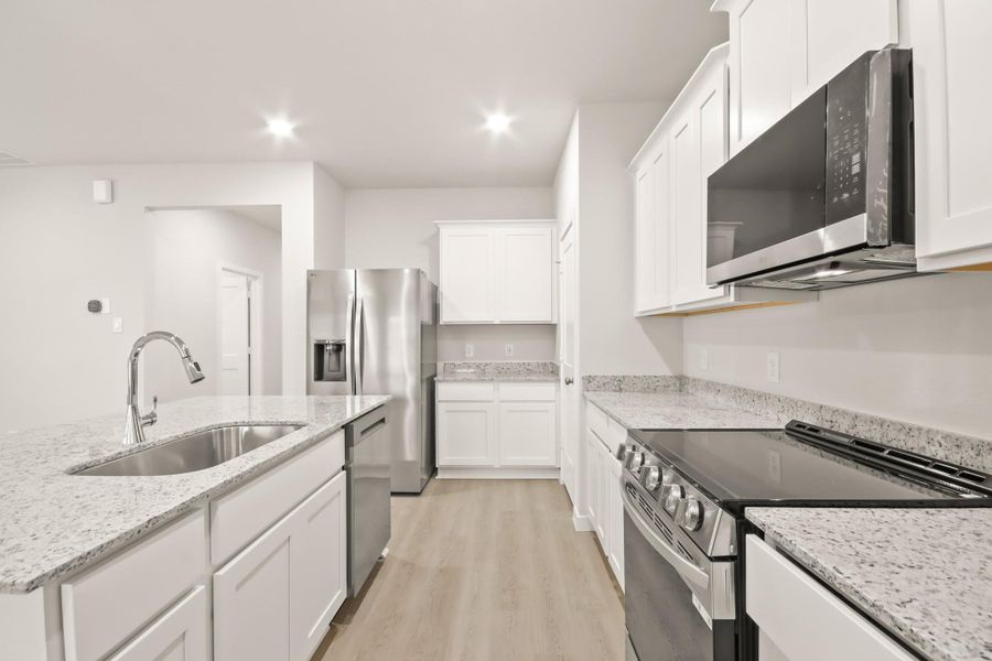 Furnished interior view inside a new home in Crockett Meadows, Conroe (Image 6).