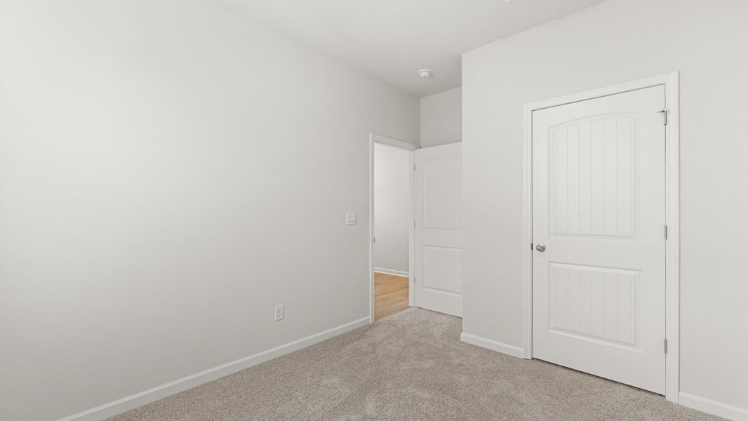 Representative unfurnished interior of a home built from the Freeport by D.R. Horton in Hamptons at Riverwood North, Dallas (Image 30).