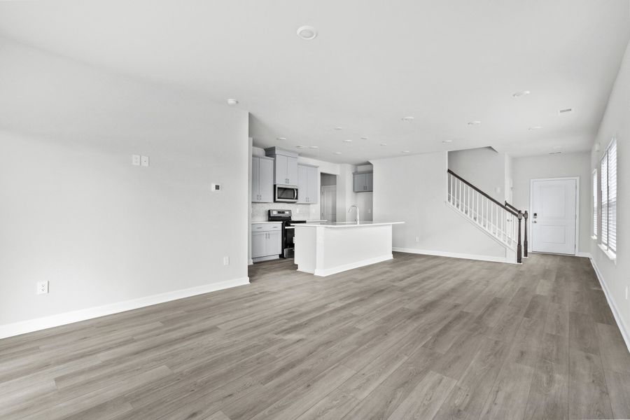 Spacious, unfurnished interior of a new home in Waterside - Boardwalk Series, Longs (Image 16).