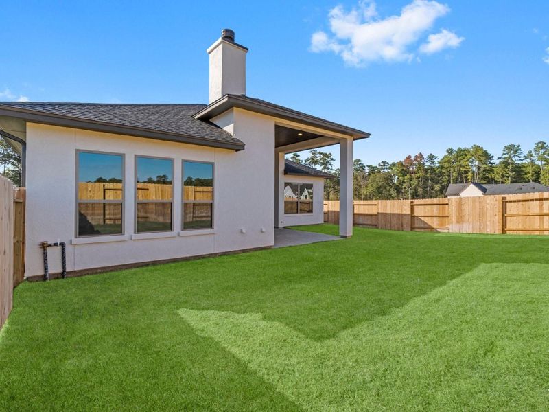 Front exterior of a new home in Audubon 60’s, Magnolia, TX, highlighting curb appeal (Image 19). Front exterior of a new home in Audubon 60’s, Magnolia, TX, highlighting curb appeal (Image 19).