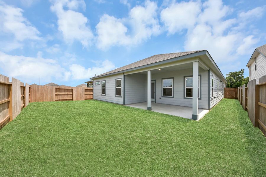Exterior details and patio area of a home in Sundance Cove, Crosby (Image 3).