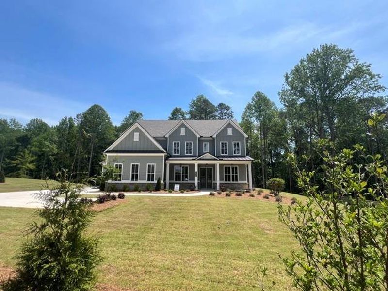 Front exterior of a new home in , Cumming, GA, highlighting curb appeal (Image 19). Front exterior of a new home in , Cumming, GA, highlighting curb appeal (Image 19).