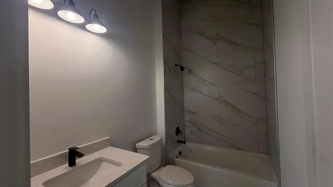 Furnished interior view inside a new home in , Port Charlotte (Image 3).