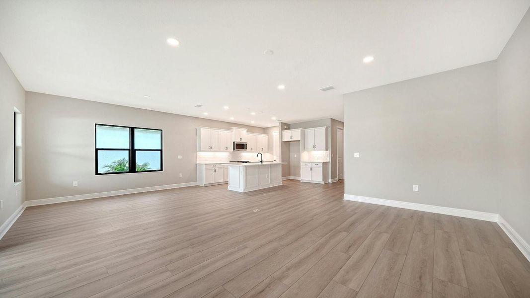 Spacious, unfurnished interior of a new home in Windward Real Estate and Homes for Sale in Sarasota, FL - Neal Communities, Lakewood Ranch (Image 22).