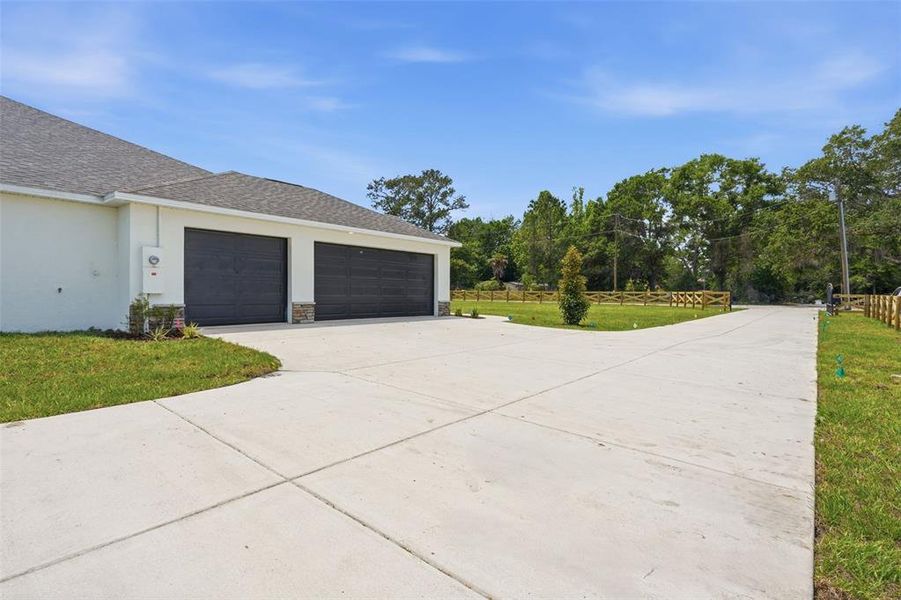 Front exterior of a new home in , Brooksville, FL, highlighting curb appeal (Image 25).