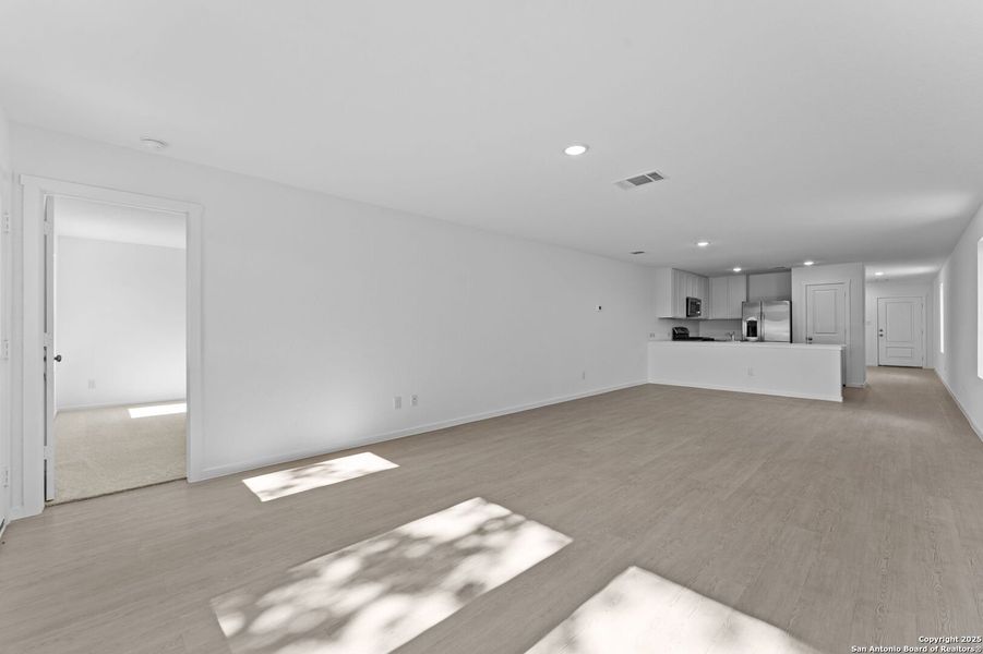 Spacious, unfurnished interior of a new home in Waterwheel: Cottage Collection, San Antonio (Image 20).