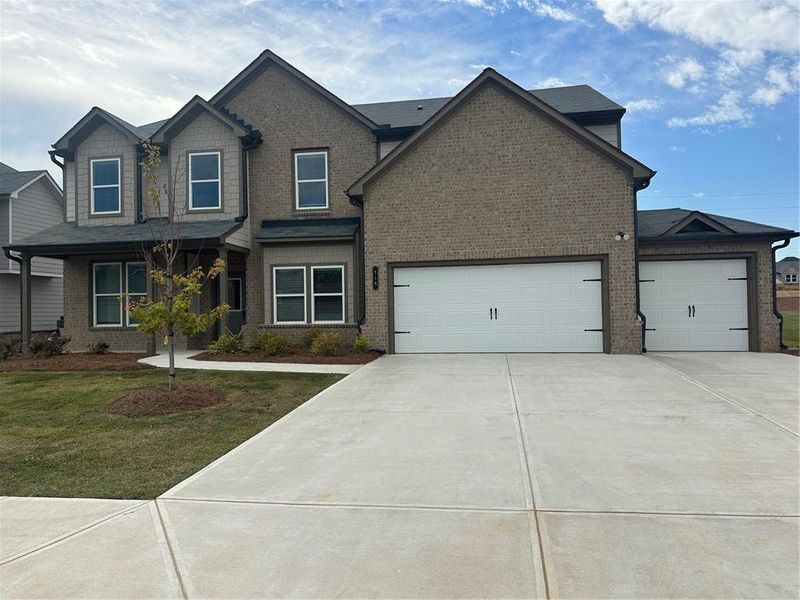 Front exterior of a new home in , Auburn, GA, highlighting curb appeal (Image 2). Front exterior of a new home in , Auburn, GA, highlighting curb appeal (Image 2).
