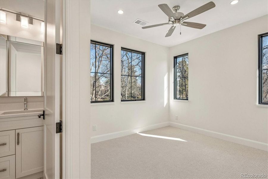 Secondary Bedroom with En-Suite Bath Secondary Bedroom with En-Suite Bath