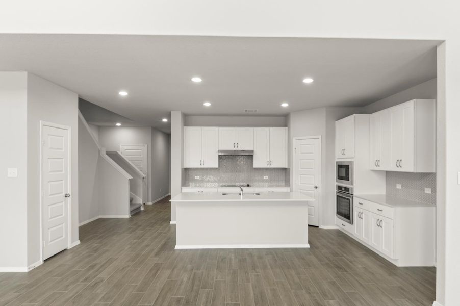 Furnished interior view inside a new home in Oaks at San Gabriel, Georgetown (Image 12).