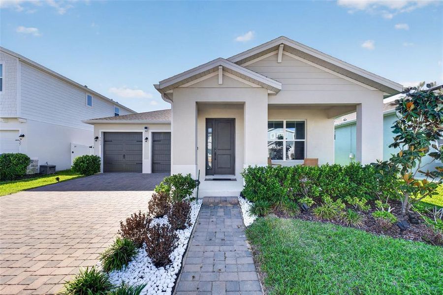 Front exterior of a new home in , Winter Garden, FL, highlighting curb appeal (Image 29).