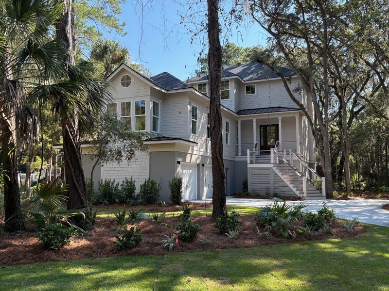 Front exterior of a new home in , Seabrook Island, SC, highlighting curb appeal (Image 2).