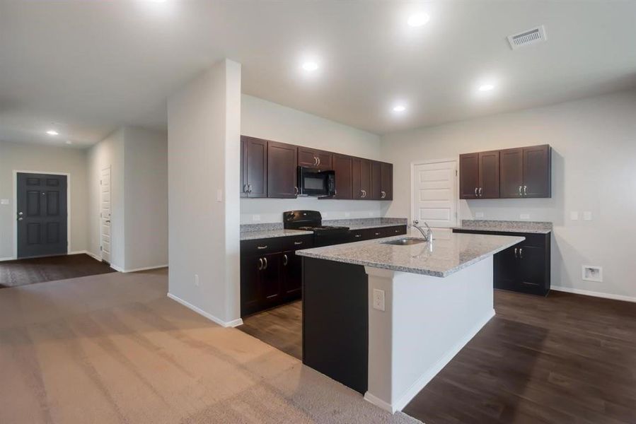 Furnished interior view inside a new home in Oaks at San Gabriel, Georgetown (Image 7).