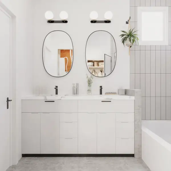 Bathroom featuring double vanity, a bath, and a sink
