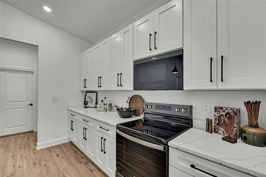 Furnished interior view inside a new home in , Weeki Wachee (Image 11).