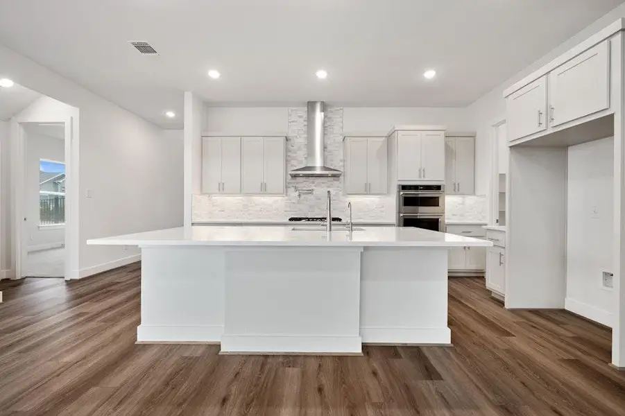 Furnished interior view inside a new home in Santa Rita Ranch, Liberty Hill (Image 10).