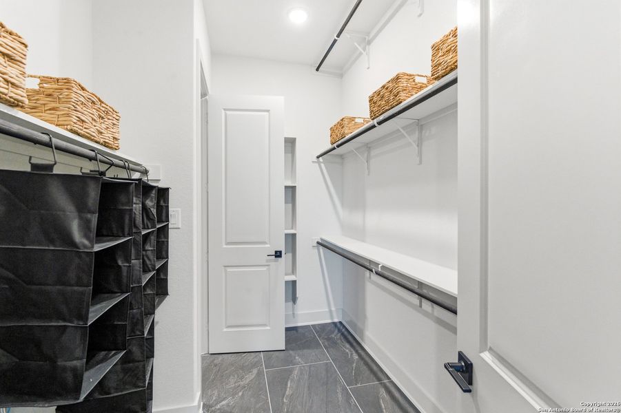 Furnished interior view inside a new home in Prominence, San Antonio (Image 9).