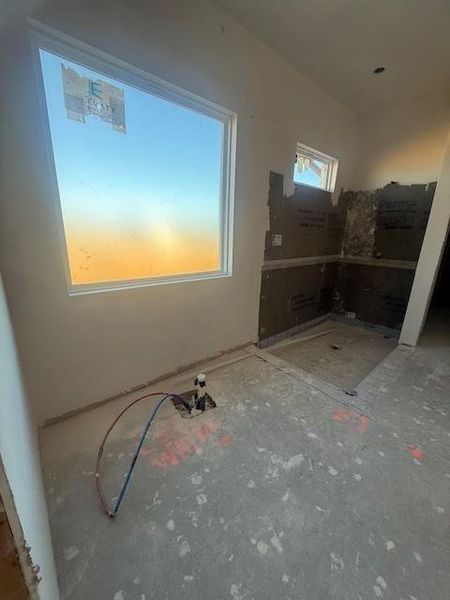 Freestanding tub will go in this place. Upgraded tile will also be installed around the wall hear for a half wall accent. Glass over-sized shower.