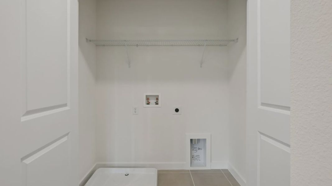 Laundry Room of the Coronado - End at Cyrene at Harmony located in St Cloud FL by DRB Homes