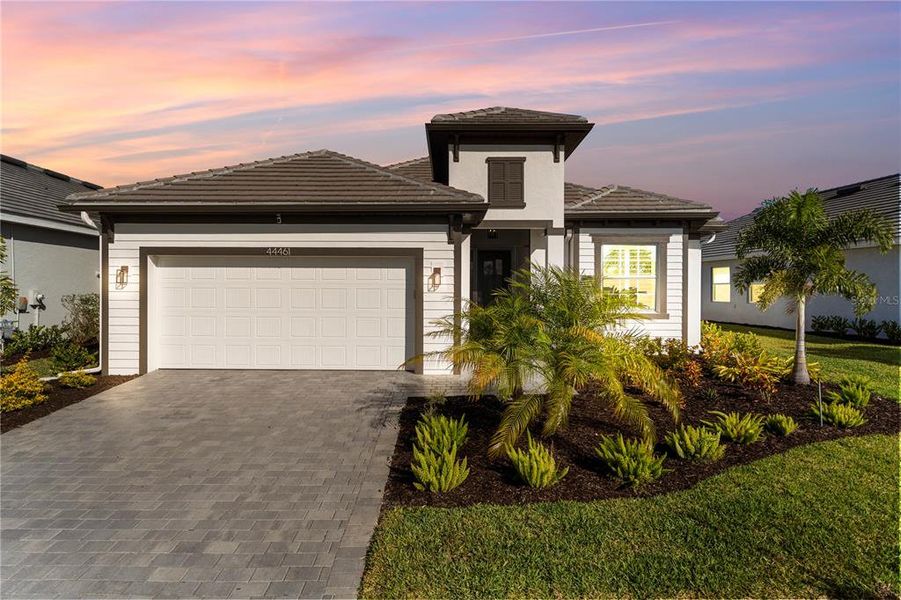 Front exterior of a new home in , Punta Gorda, FL, highlighting curb appeal (Image 20).