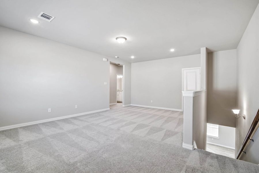 Representative unfurnished interior of a home built from the The Tulip by Lillian Custom Homes in The Preserve, Sherman (Image 21).