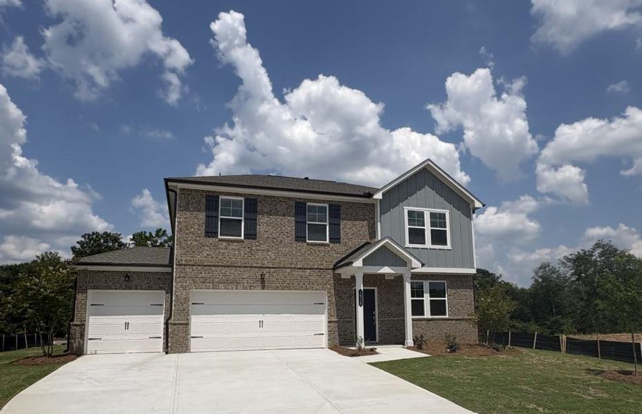 Front exterior of a new home in Apalachee Hills, Bethlehem, GA, highlighting curb appeal (Image 1). Front exterior of a new home in Apalachee Hills, Bethlehem, GA, highlighting curb appeal (Image 1).
