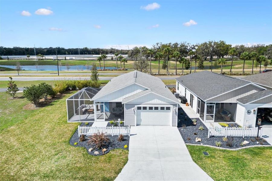 Front exterior of a new home in , The Villages, FL, highlighting curb appeal (Image 23). Front exterior of a new home in , The Villages, FL, highlighting curb appeal (Image 23).