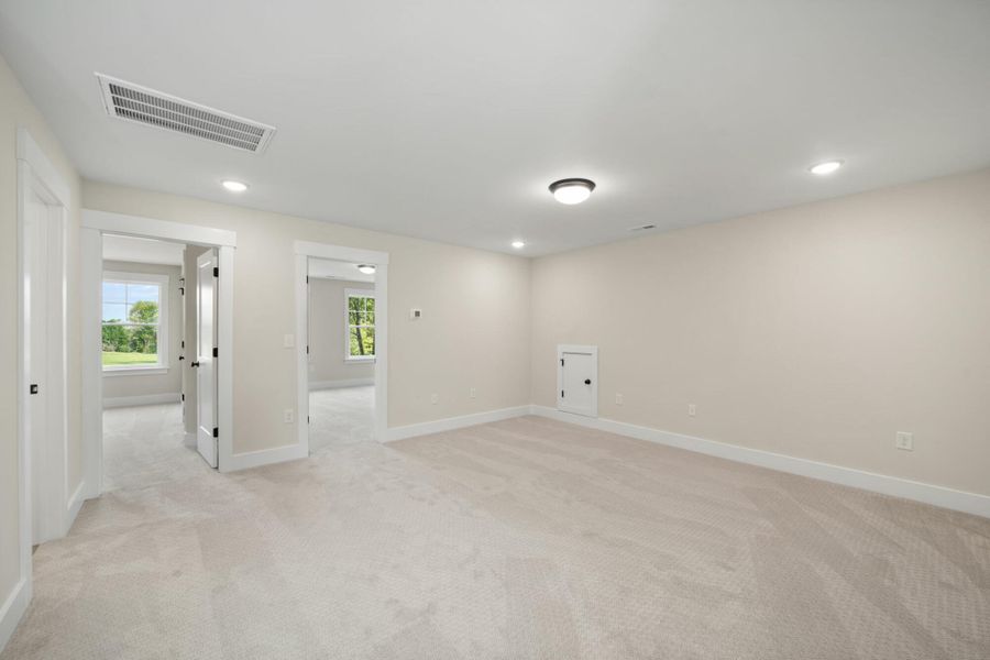 Spacious, unfurnished interior of a new home in Fiddler's Ridge, Advance (Image 37).
