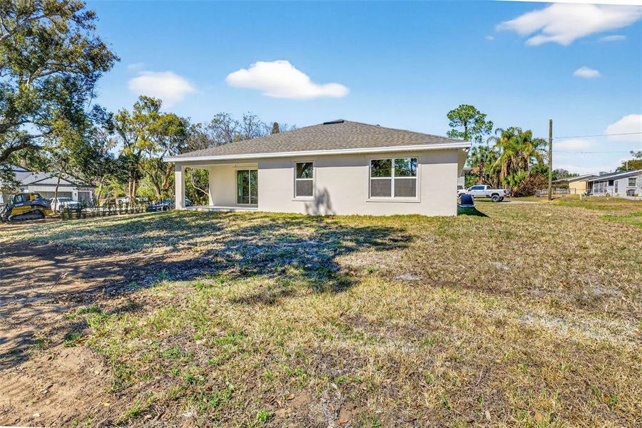 Exterior details and patio area of a home in , Dade City (Image 28).
