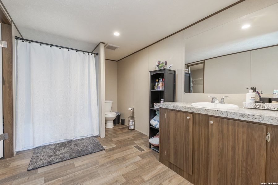 Furnished interior view inside a new home in , Elmendorf (Image 7).