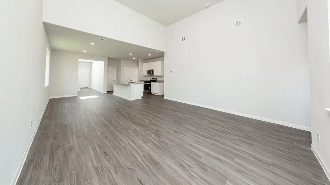 Family Room to Dining Area and Kitchen Family Room to Dining Area and Kitchen
