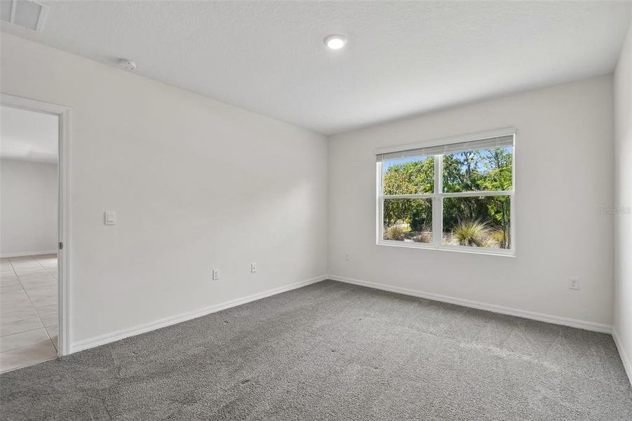 Spacious, unfurnished interior of a new home in Riviera Bella, Debary (Image 40).