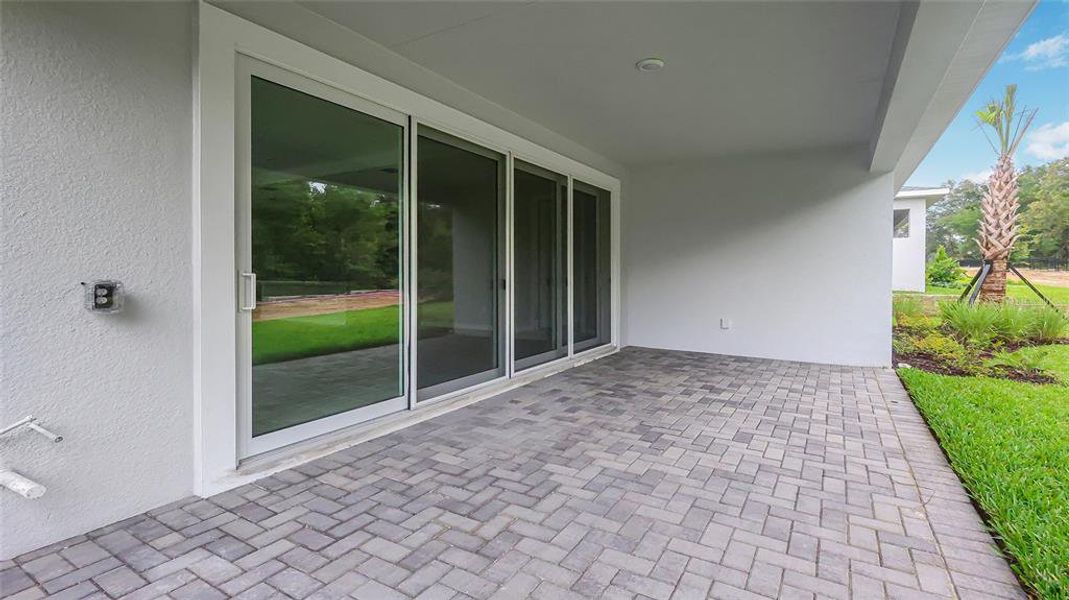 Exterior details and patio area of a home in Cresswind at Hammock Oaks, Lady Lake (Image 3). Exterior details and patio area of a home in Cresswind at Hammock Oaks, Lady Lake (Image 3).