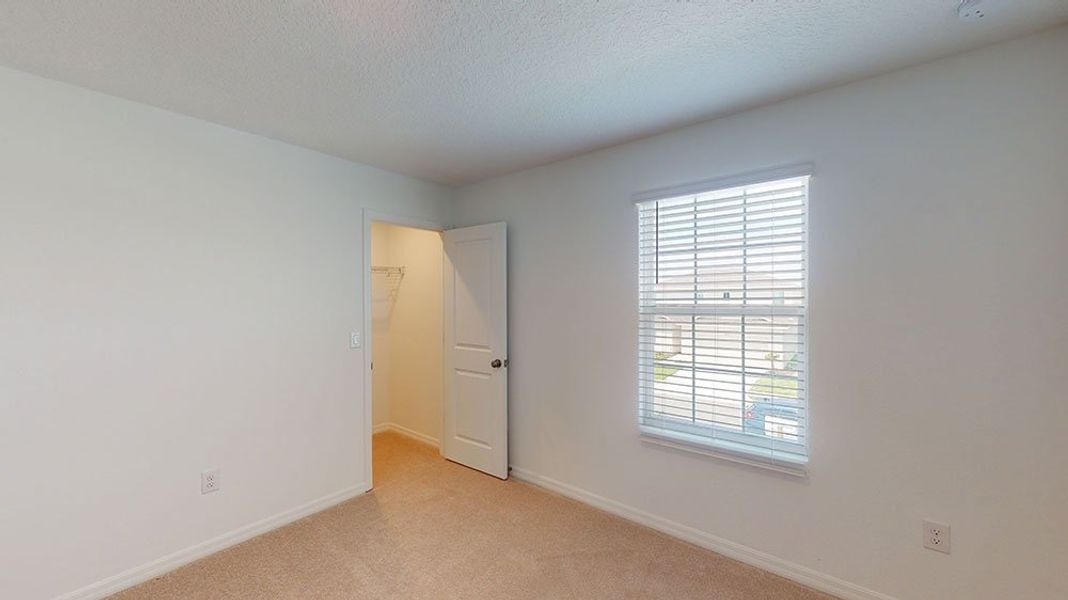 Representative unfurnished interior of a home built from the Azalea by Taylor Morrison in Riverfront, Edgewater (Image 17).