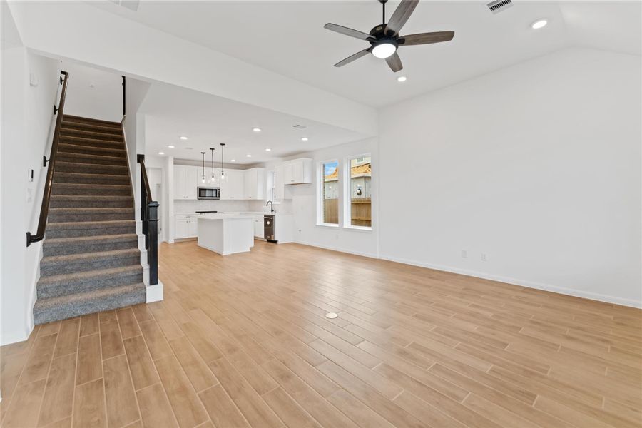 Spacious, unfurnished interior of a new home in Sunterra, Katy (Image 14).