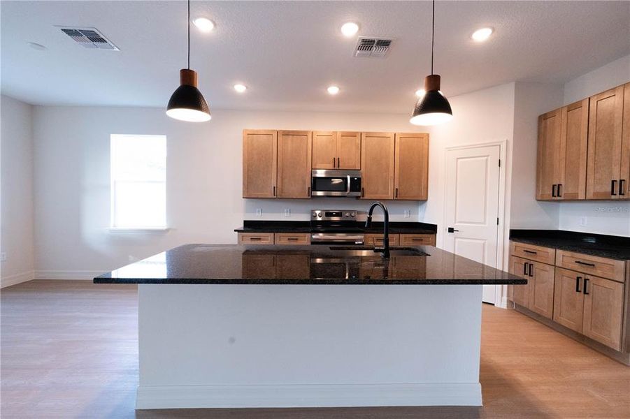 Furnished interior view inside a new home in , Tavares (Image 38).