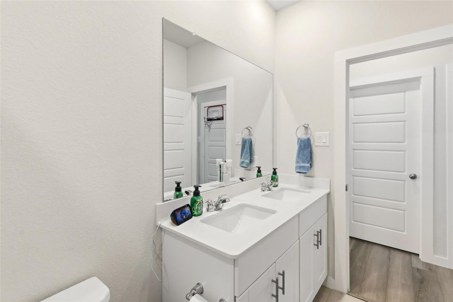 Furnished interior view inside a new home in Heights of Barbers Hill, Mont Belvieu (Image 21).