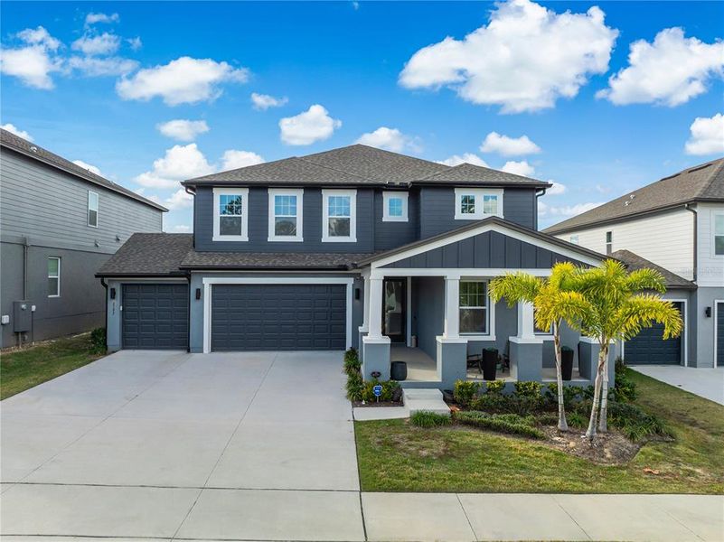 Front exterior of a new home in , Minneola, FL, highlighting curb appeal (Image 2). Front exterior of a new home in , Minneola, FL, highlighting curb appeal (Image 2).