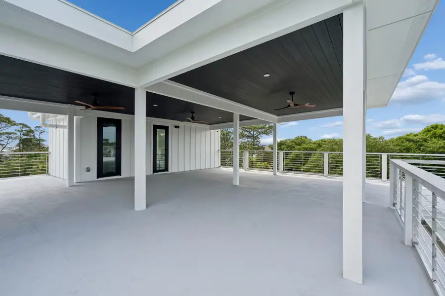 Exterior details and patio area of a home in , Folly Beach (Image 3).
