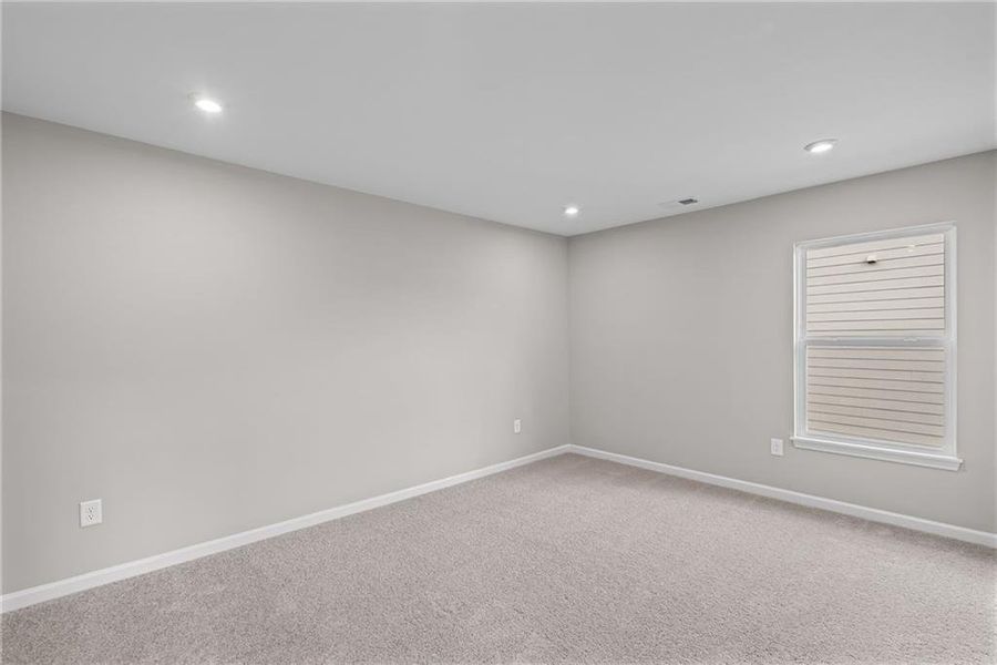 Spacious, unfurnished interior of a new home in The Reserve At Liberty Park, Braselton (Image 37).