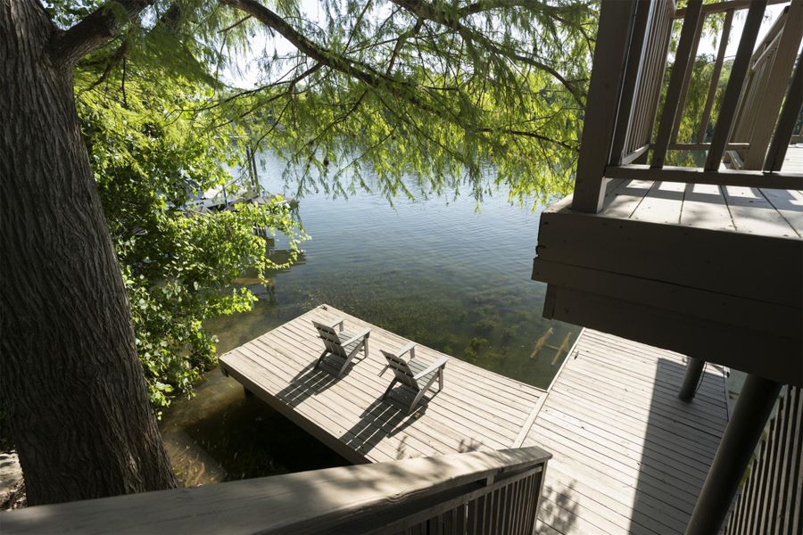 Dock area featuring a water view