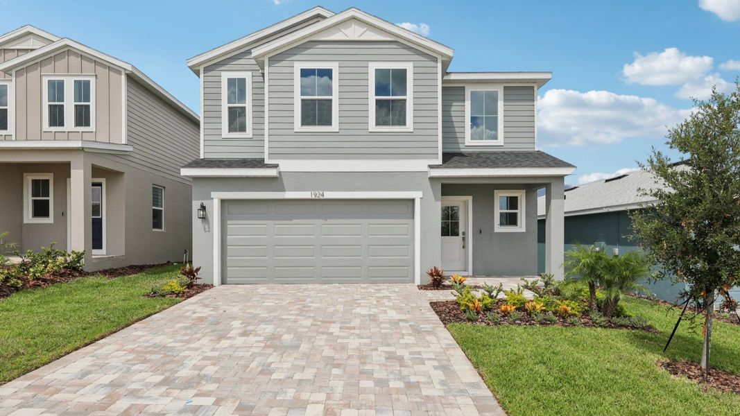 Representative exterior photo of a completed home built from the Naples by DRB Homes in Hamilton Bluff, Haines City, FL (Image 5).