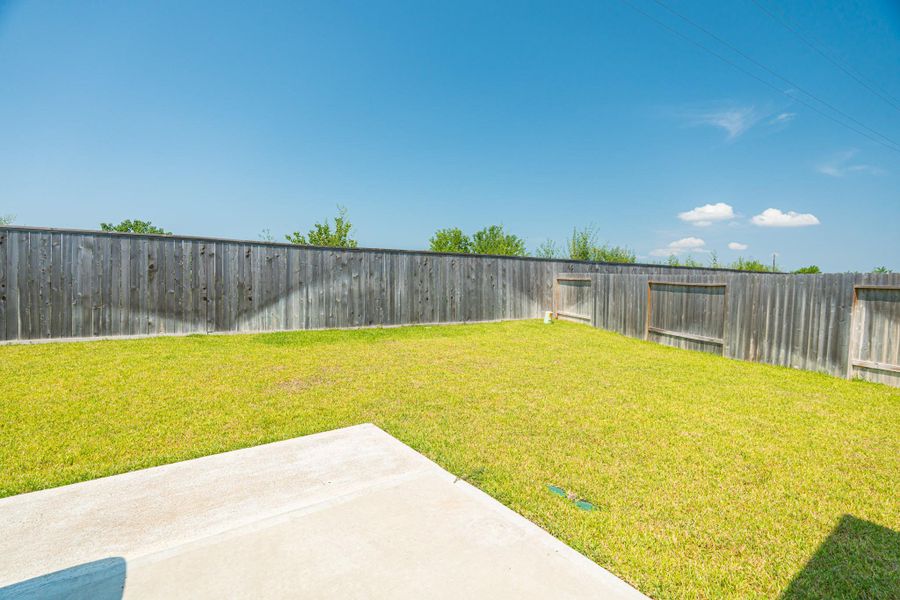 Front exterior of a new home in Lonestar Collection at Aurora, Katy, TX, highlighting curb appeal (Image 23). Front exterior of a new home in Lonestar Collection at Aurora, Katy, TX, highlighting curb appeal (Image 23).