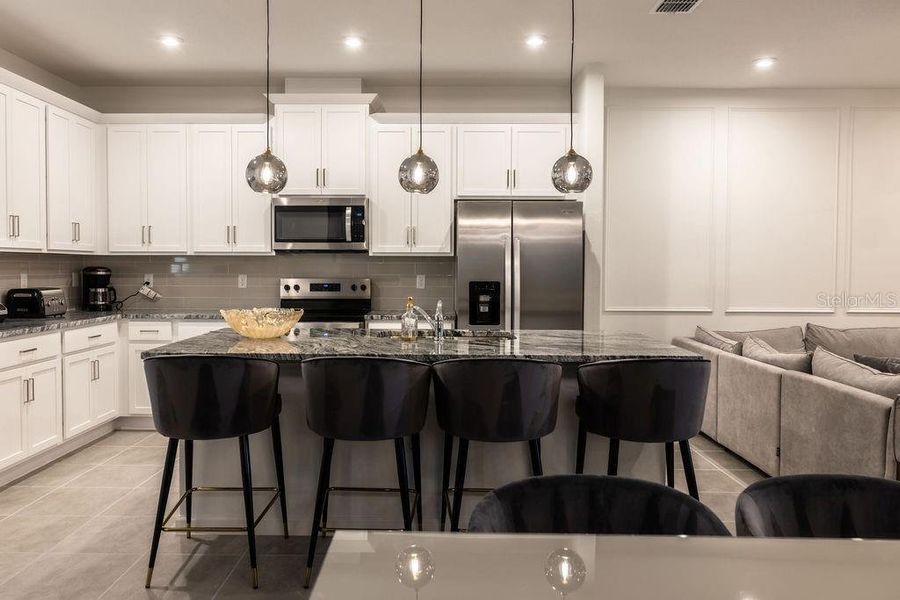 Furnished interior view inside a new home in , Kissimmee (Image 9). Furnished interior view inside a new home in , Kissimmee (Image 9).