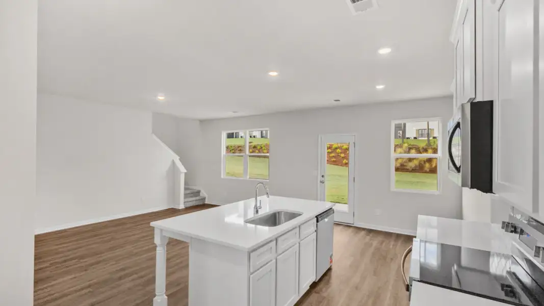 Representative furnished interior of a home built from the Ansley by D.R. Horton in Walden Ridge, Macon (Image 8).