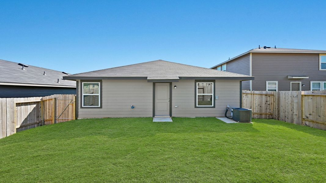 Exterior details and patio area of a home in McCrorey Trails, Conroe (Image 12).