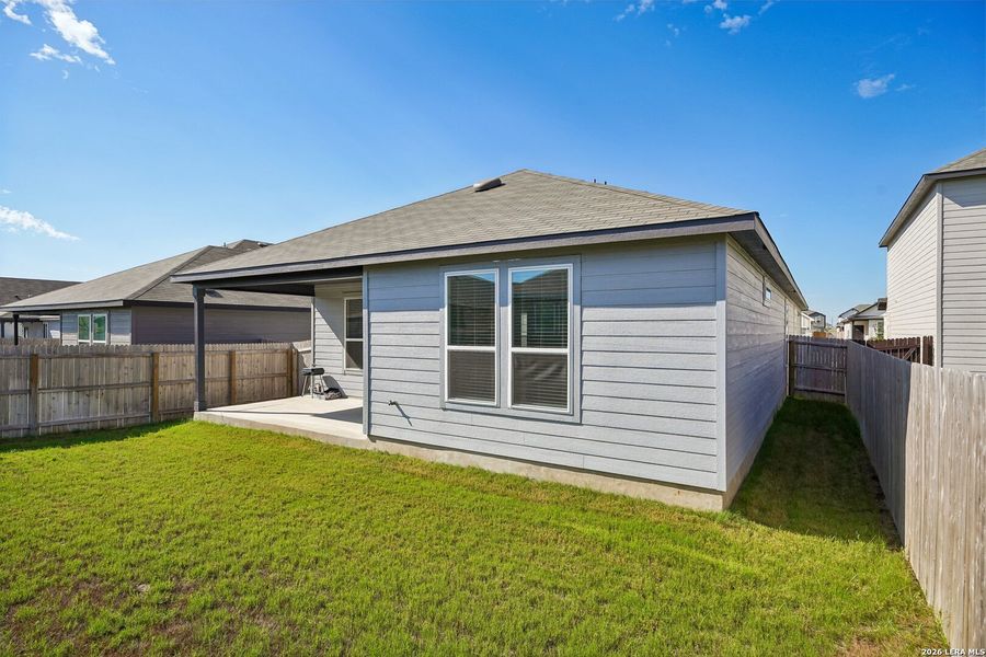 Exterior details and patio area of a home in Dove Song, Marion (Image 24).