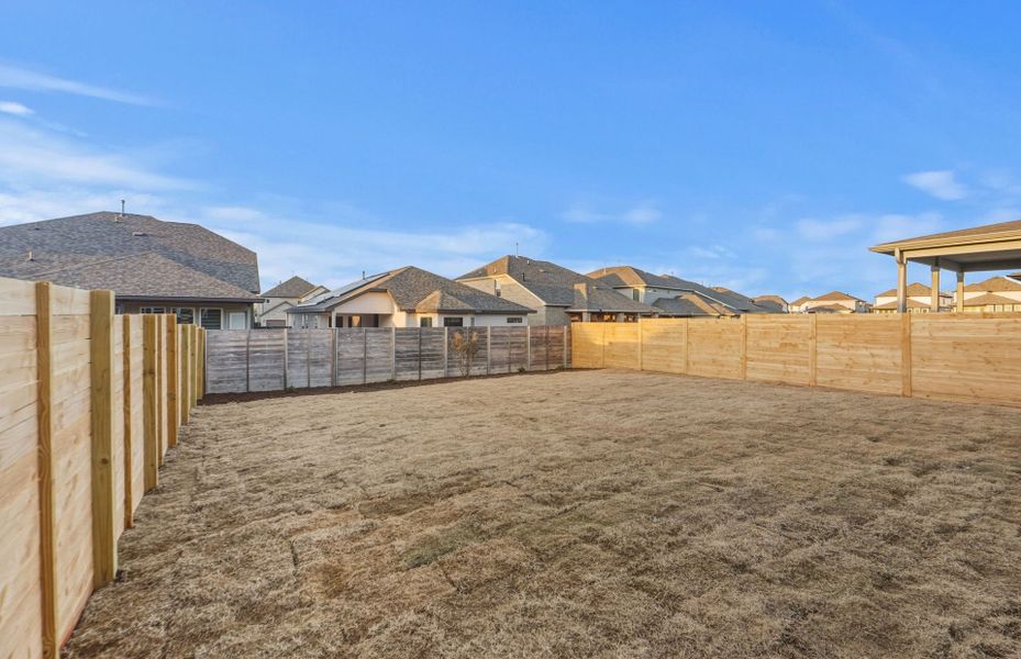 Exterior details and patio area of a home in Horizon Lake, Leander (Image 30).
