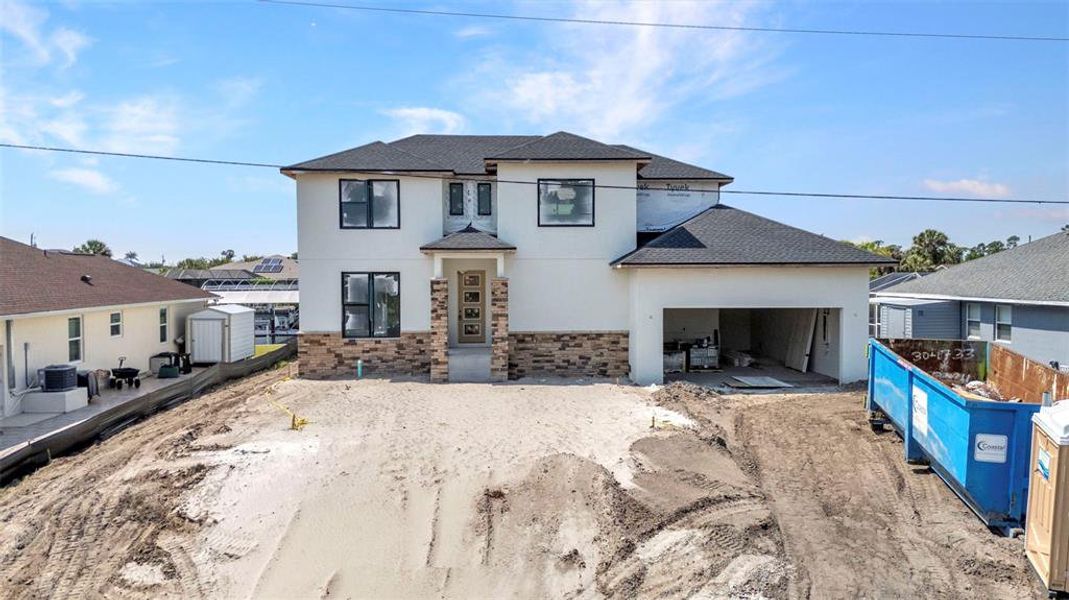 Front exterior of a new home in , Port Charlotte, FL, highlighting curb appeal (Image 19).