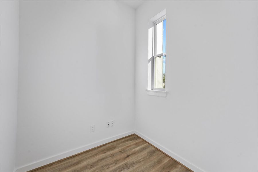 Spacious, unfurnished interior of a new home in Highland Commons, Houston (Image 10).