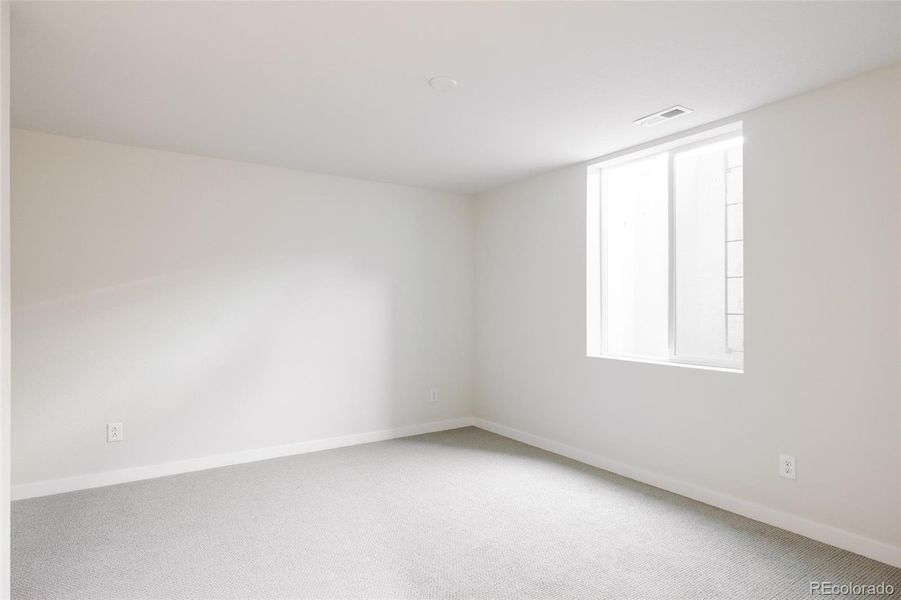 Spacious, unfurnished interior of a new home in Lyric at Ridgegate, Lone Tree (Image 21).